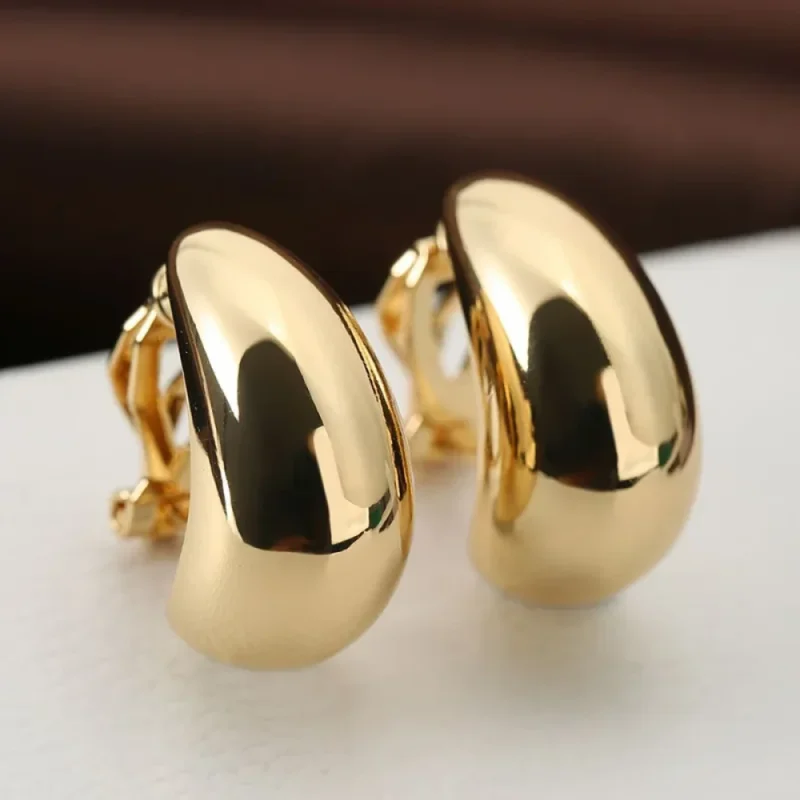 Boucles d'oreilles clips dorées en goutte bombée effet miroir