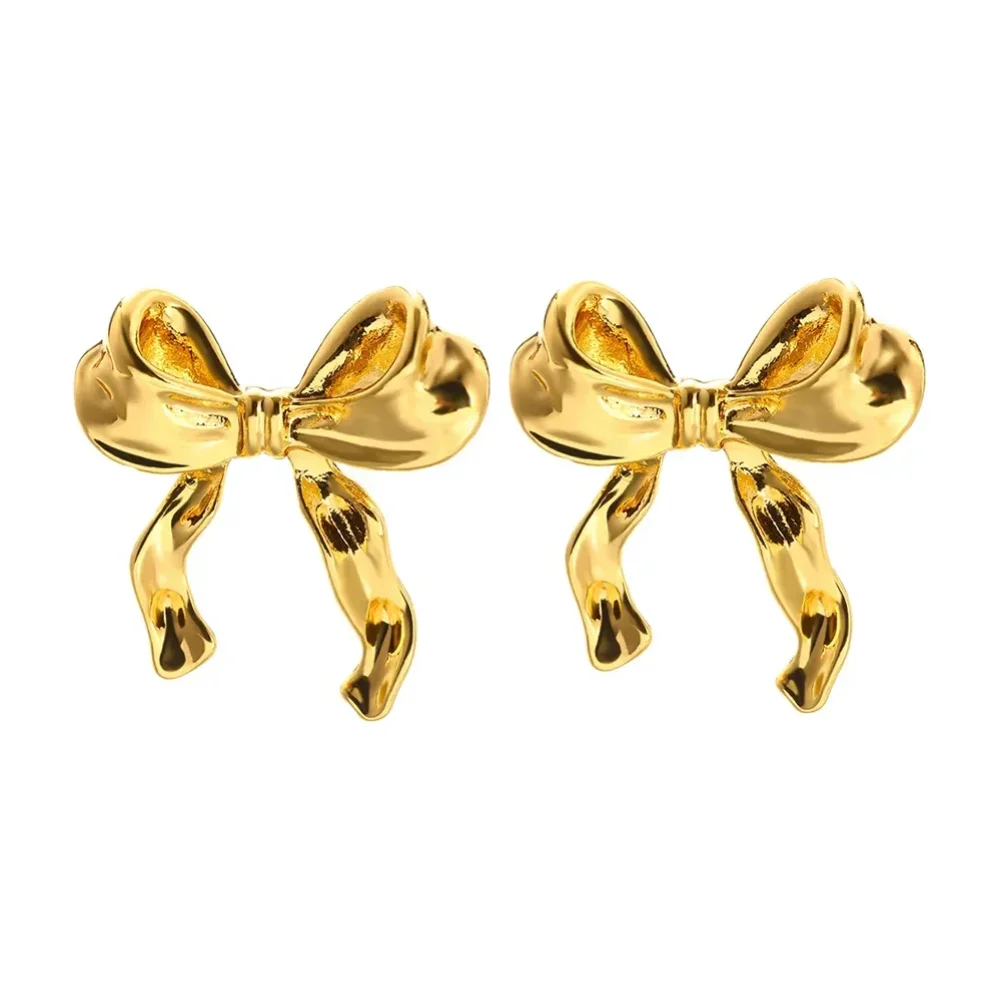 Paire de boucles d'oreilles dorées en forme de gros nœud