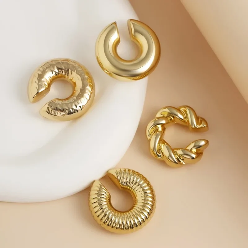 Lot de 4 clips d'oreilles dorés torsadés et striés