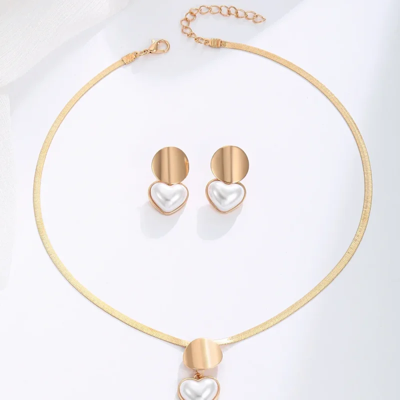 Parure dorée collier cœur perle et boucles d'oreilles assorties