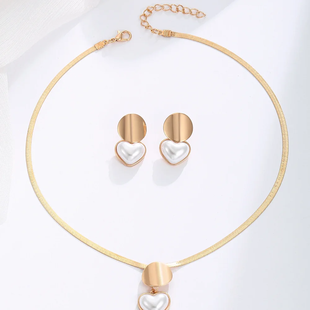 Parure dorée collier cœur perle et boucles d'oreilles assorties